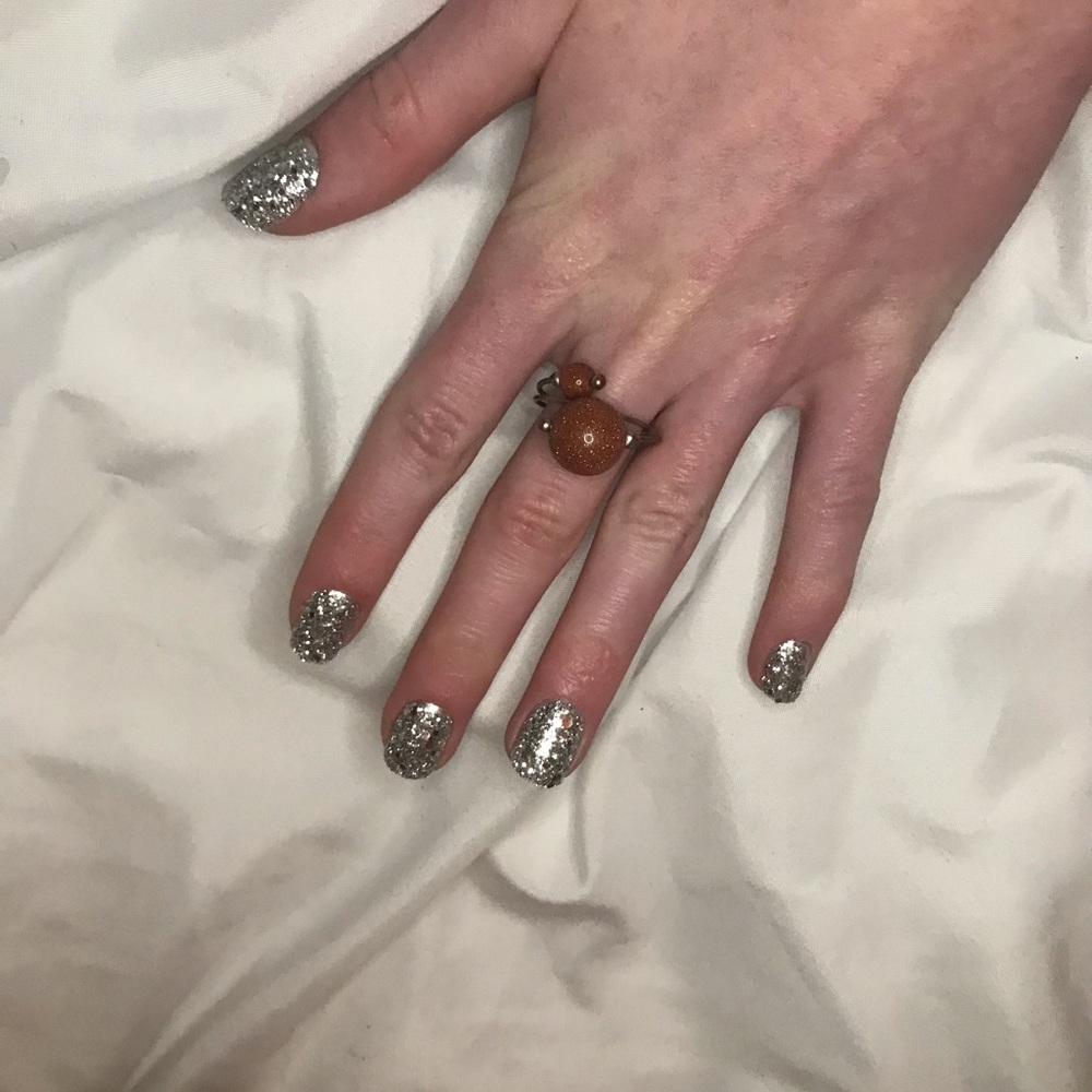 Sparkly bronze planet inspired ring